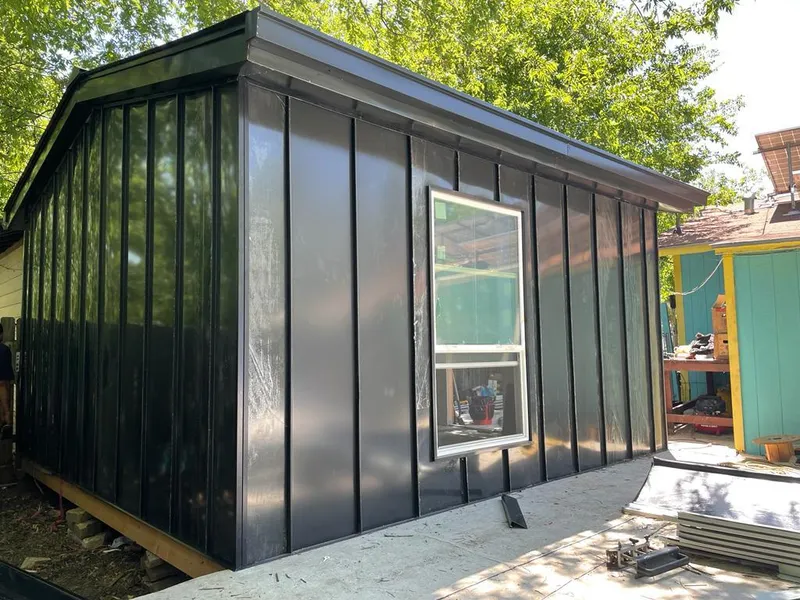 Black standing seam metal wall panels for Metal Roof Installation in Post Falls