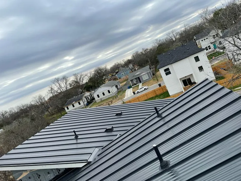 Standing seam metal roof panels with vents for Skylight Repair in Post Falls